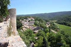 Menerbes, tower and village