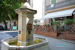 Mormoiron, fountain and cafe terrace